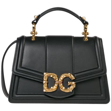 d&g dolce&gabbana logos on handbags.